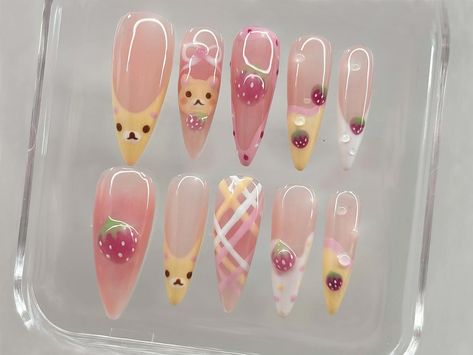 ✨🍓 Kawaii Sweet Treats Press-On Nail Set | Cute Dessert-Themed Nails with Pastel Colors 🍰💕 Indulge in the sweetness of our Kawaii Sweet Treats Press-On Nail Set! Designed for lovers of all things cute and sugary, this set features adorable dessert-inspired designs and soft pastel hues, perfect for adding a touch of whimsy to any outfit. 🎨🍦 Key Features & Highlights: Sweet Dessert Designs: Each nail is meticulously crafted to showcase charming dessert motifs, including ice cream cones, cute donuts, and fresh strawberries. These playful designs are sure to spark joy and add a playful vibe to your style. 🍩🍦 Pastel Color Palette: Soft pinks, creamy yellows, and delicate whites make up the color scheme, evoking the look of your favorite sweet treats. These colors are designed to be light Kawaii Set Nails, Ongles Rose Pastel, My Melody Press On Nails, Kwaii Press On Nails, Japanese Nail Art Kawaii Charms, Gyaru Press On Nails, Fruit Nail Art, Kawaii Faces, Cute Donuts