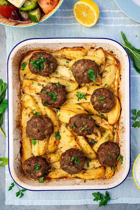 Bifteki (One Pan Greek Burgers And Potatoes) - Scrummy Lane Crisp Potatoes, Greek Burgers, Greek Burger, Mediterranean Holiday, Greek Lemon Potatoes, Greek Dinners, Potato Wedges Baked, Greek Potatoes, Ground Beef And Potatoes