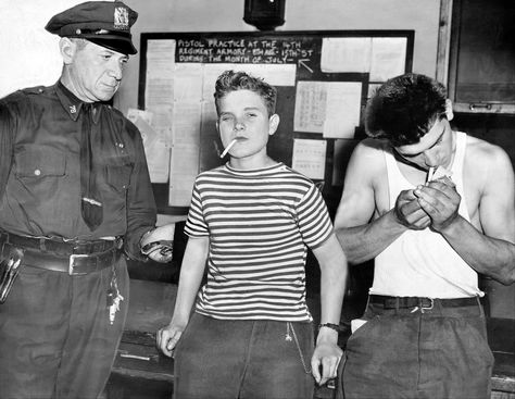 Robert "Curly Bill" Naschak, 16, and Ralph Yamicello, 20, are held at the Bergen Street police station on stickup charges on Aug. 1, 1943.. Disturbing Pictures, Bullet Proof Vest, Teddy Boys, Social Club, Underworld, Mug Shots, Instagram Foto, Our Lady, Old Photos