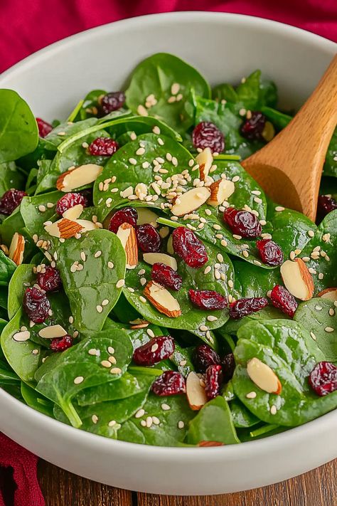 Delicious Christmas Cranberry Spinach Salad Salad With Craisins Recipes, Easy Picnic Salads, Winter Spinach Salad, Christmas Spinach Salad, Salad Recipes With Spinach, Spinach Salad With Raspberry Vinaigrette, Spinach Salad With Cranberries, Spinach Salad Recipes Easy, Cranberry Recipes Healthy