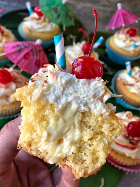 Dorothy Dean presents: You’ll like these piña colada cupcakes – and it won’t require getting caught in the rain | The Spokesman-Review Pina Colada Birthday Party, Pina Colada Cupcakes Non Alcoholic, Pina Colada Cupcake Recipe, Pina Colada Cupcakes With Rum, Pins Colada Cupcakes, Pina Colada Cupcakes With Box Cake, Hawaiian Cupcakes Ideas, Summer Flavor Cupcakes, Margaritaville Cupcakes