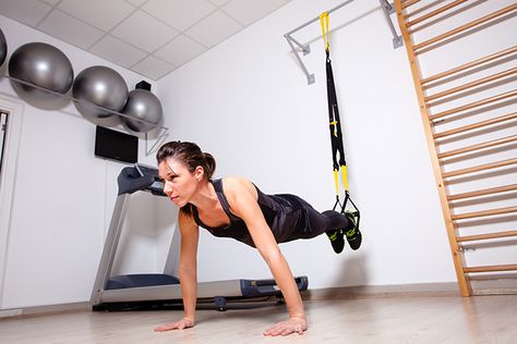 You may have seen the TRX in your favorite gym, but that piece of equipment is versatile enough to help you get in a workout at home or just about anywhere. Trx Home Gym, Dream Home Gym, Trx Training, Suspension Trainer, Basement Gym, Trx Workouts, Gym Room At Home, Gym At Home, Workout Space