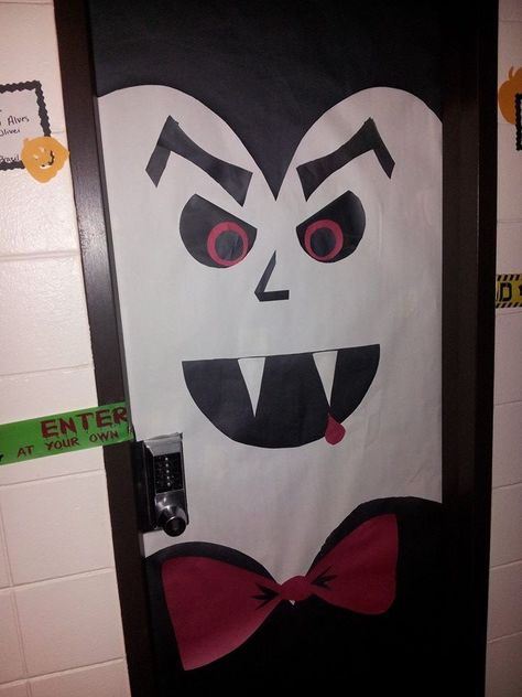 My vampire door for the decorating contest in the dorms! Origami Halloween Decorations, Kid Friendly Halloween Decorations, Halloween Classroom Door, Halloween Origami, Lego Halloween, Kid Friendly Halloween, Halloween Classroom, Halloween Door Decorations, Door Decorations Classroom