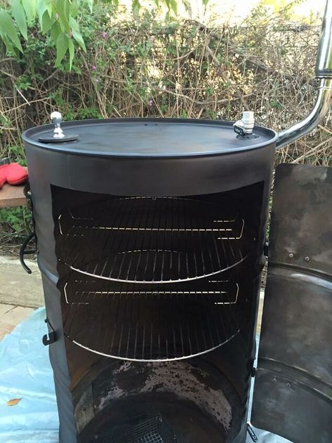 behold the jd smoker a huge bbq smoker out of 2 barrels Build A Smoker, Wine Barrel Coffee Table, Custom Bbq Smokers, Barrel Bbq, Diy Smoker, Barrels Diy, Barrel Smoker, Homemade Smoker, Wine Barrel Table