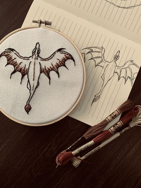 Fantasy embroidery🍄✨🐉🔮 #dragon #fantasy #embroidery Embroidery Fantasy Design, House Of The Dragon Embroidery, Targaryen Embroidery, Dnd Embroidery, Embroider Bag, Alt Embroidery, Dragon Embroidery Pattern, Embroidery Fairy, Fantasy Embroidery