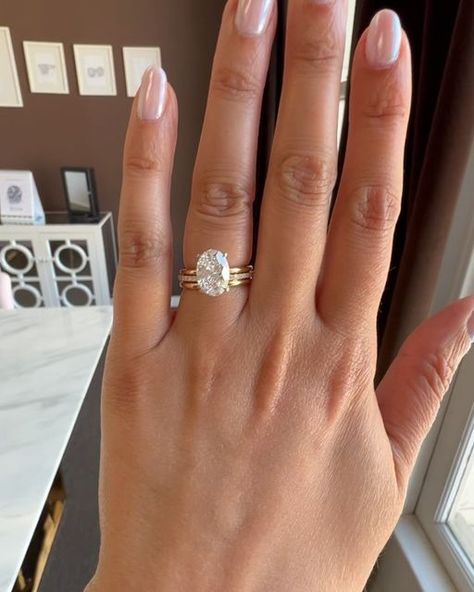 Adiamor on Instagram: "Tag your partner to drop a hint if you would love this perfect Oval Diamond Engagement Ring set😍  ✨this ring stacks well with a spacer band ✨oval diamonds look amazing on everyone! ✨2.50 carats is a great choice for subtle sparkle  ✨this ring is extremely customizable   Ring details: 2.50 oval Lab grown F VS1 10.84 × 7.62 x 4.81 mm 1.42. LWR R3128 basket solitaire 18 k yellow gold Size 5 Custom platinum basket  Custom hidden Halo Shown with R3016 1.7mm plain RF3001 open spacer band Custom 2mm width" Gold Wedding Ring With Oval Diamond, Solitaire Oval Engagement Ring With Band, Oval Engagement Ring And Band, Oval Engagement Ring With Band, Gold Oval Engagement Ring With Band, Wedding Band With Oval Engagement Ring, Oval Wedding Ring Set Stack, Gold Oval Wedding Ring, Oval Ring Stack