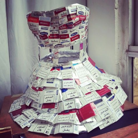 High school art project: Limitation/recycling theme. A dress made of recycled cigarettes boxes . 100% lebanese  :) High School Art Projects, Recycled Dress, Milk Box, Recycle Box, High School Art, School Art Projects, Dress Out, School Art, Kids Art Projects