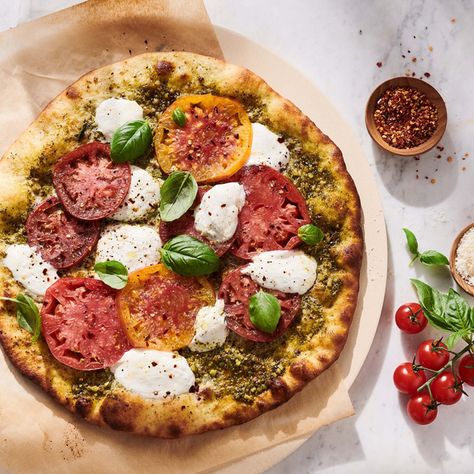 Check out Burrata and Heirloom Tomato Pizza with Basil Pesto recipe and more from Sur La Table! Sur La Table Recipes, Pizza With Basil, Burrata Pizza, Tomato Pizza, Basil Pesto Recipes, Make Your Own Pizza, Heirloom Tomato, Pesto Recipe, Basil Pesto