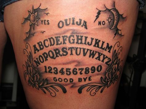 ouija board | ouija board | Flickr - Photo Sharing! Ouija Board Tattoo Design, Ouija Board Tattoo, Rose Tattoo Black, Ouija Tattoo, Tattoo Schrift, Pieces Tattoo, Text Tattoo, Stomach Tattoos, Tattoo Script