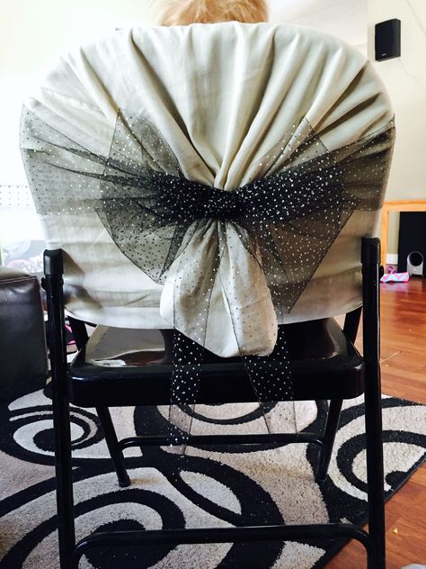 Metal chair cover. Pillow case and tulle. Diy How To Make Metal Chairs Look Nice For Wedding, Metal Chair Covers Diy, Diy Wedding Chair Covers, Black Tablecloth White Chair Covers, Elegant Silver Tulle Fabric For Party, Diy Butterfly Chair Cover, Metal Folding Chair Covers, Wedding Chairs Diy, How To Make Metal