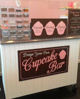 What a great idea for a cupcake shop! A cupcake bar where you choose the cupcake, frosting, and put on your toppings! Love that idea Bakery Event Ideas, Bake Shop Decor Ideas, Cupcake Shop Design, Food Trailer Food Ideas, Girly Bakery, Cupcake Shop Interior, Cupcake Store, Cupcake Wall, Girly Diy