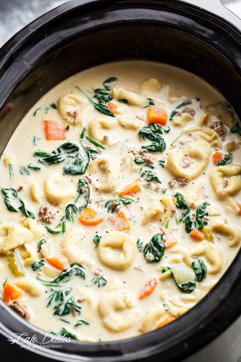 Slow Cooker Creamy Tortellini Soup | http://cafedelites.com Slow Cooker Creamy Tortellini Soup, Creamy Sausage Tortellini Soup, Creamy Sausage Tortellini, Slow Cooker Tortellini Soup, Italian Sausage Tortellini Soup, Creamy Tortellini, Creamy Tortellini Soup, Sausage Tortellini Soup, Sausage Tortellini