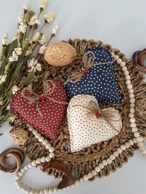 "The rustic hearts set can be used to decorate any space in your home. You can put them on shelves, tiered tray, baskets, bowls, tables and more.  They are made of cotton fabric, jute  and polyester. The hearts are perfect for the 4th of July decor! Each heart measures 6\"W x 6\"L. They come in different colors. Contact me if you have any questions.  Thank you for looking." 4th Of July Fabric Crafts, Cloth Hearts Sew, Fabric Heart Garlands, Heart Fabric Ornament, Quilt Heart Pillows, Rustic Hearts, Mini Pillows, Valentine Art Projects, 4th Of July Decor