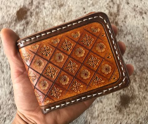 "To receive a discount code, copy and paste URL and sign up for email list :) https://dashboard.mailerlite.com/forms/606675/99831821162775737/share -----ITEM DESCRIPTION-----  This is a plain hand tooled bifold wallet, made of quality veg tanned leather dyed and water proof finished.  There are 3 card slots, coin pocket and 2 side pocket as well as a large note pocket. 6 card pocket only option is available too if you do not carry coins.   Size : 9 cm x 11 cm folded -----ABOUT MY PRODUCTS----- All my products are made of high quality veg tanned leather.  Production starts once I confirm what design and personalised attributes are desired by each customer. You can see videos of how I make things on my Etsy about page and also on my website or my blog.  -----ABOUT VEG TANNED LEATHER----- Veg Things To Make Out Of Leather, Leather Patterns Templates, Leather Wallet Design, Tooled Leather Wallet, Leather Working Patterns, Tooled Leather Belts, Leather Tooling Patterns, Tooling Patterns, Leather Anniversary Gift