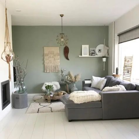 Picture of a boho living room with a green accent wall, a grey sectional, a built in fireplace, a lot of cool and catchy boho home decor Sage Living Room, Sage Green Living Room, Bold Living Room, Green Accent Walls, Living Room Decor Gray, Accent Walls In Living Room, Boho Living Room Decor, Living Room Green, White Living Room