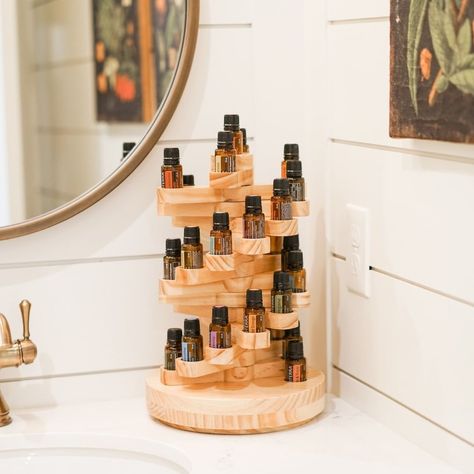 Oil Life on Instagram: “😍 NEW Spiral Display | NOW AVAILABLE 😍⠀⠀⠀⠀⠀⠀⠀⠀⠀ ⠀⠀⠀⠀⠀⠀⠀⠀⠀ Show off your most-loved essential oils with this eye-catching display.…” Essential Oil Display Ideas, Spa Storage, Essential Oil Display, Essential Oil Rack, Oil Display, Essential Oils Organization, Perfume Stand, Oil Rack, Eco Decor