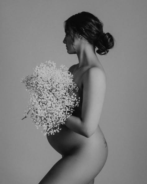 This studio maternity session was a joy to capture. The baby's breath and the robe were the only props this gorgeous soon-to-be-mom needed. Studio maternity sessions allow the mama to be the complete star of the show with no distractions, as it should be.│Lena Nugent Photography, Boston Massachusetts studio photographer.│#indoormaternitysession #studiomaternitysession #maternityphotographer #bostonmaternityphotographer #babysbreathmaternity #naturematernity #nudematernity Maternity Photography With Robe, Maternity Shoot Indoor Studio, Budiour Maternity Photos, Baby Breath Maternity Shoot, Maternity Boudiour Photoshoot In Studio, Cool Maternity Shoot, Budoir Sessions Maternity, Boudiour Maternity Photography, Editorial Maternity Photography