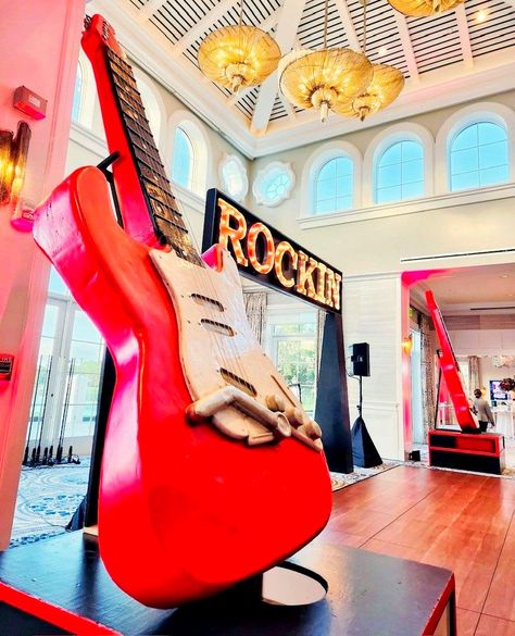 Striking chords and neon lights! 🎸✨ Dive into the rock and roll rhythm with our electrifying setup. #redguitar #rocknroll #rocknrolltheme #rockandrolltheme #rockandroll #rockin #rockandrollevent #lightupsign #eventdecor #rocktheme #musictheme #musicevent #florida Red Guitar, Rock Of Ages, Light Up Signs, 80s Party, Event Themes, Music Event, Neon Lights, Summer Camp, Event Decor