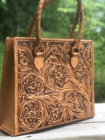 Nothing quite finishes a look like a beautiful hand-tooled leather purse. Our bags have a timeless style and durability, you will feel amazing and very original wearing one of our genuine handcrafted handbags, Whatever is your style you need an ALLE in your closet. Perfect as a gift for her, Free Shipping USA Mexican Purse, Tooled Leather Handbags, Vintage Leather Handbag, Tooled Leather Bag, Tooled Leather Purse, Brown Leather Totes, Large Leather Tote, Gorgeous Leather, Handmade Purses