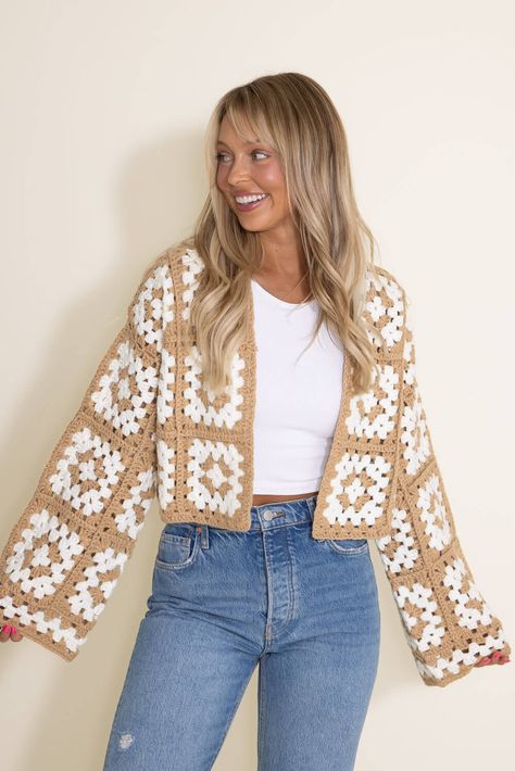 This Granny Square Crochet Cropped Cardigan for Women in Beige/White will get you ready for the transitioning weather with the lightweight knit. It features bell sleeves and a cropped look. Perfect to dress up or down! Features: Style: SWC10981-BEIWHT Color: Beige/White 100% Acrylic Women’s Cardigan Lightweight Relaxed fit Bell sleeves Relaxed crop fit Measurements from size small: Length from center back: 17” Chest: 42” Hand wash cold, lay flat to dry Granny Square Haken, Look Boho Chic, Gilet Crochet, Mode Crochet, Kleidung Diy, Crochet Jacket, Top Shirt Women, Chale Crochet, Skirt Sets