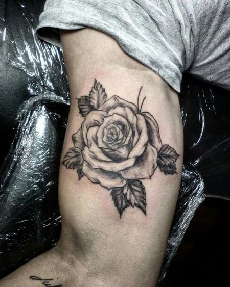 Rose Bicep Tattoos Rose Tattoo Men Bicep, Bicep Rose Tattoo, Rose Bicep Tattoo, Inner Bicep Tattoo Ideas, Bicep Tattoos For Men, Bicep Tattoo Ideas, Bicep Tattoo Women, Bicep Tattoos, Tiger Face Tattoo