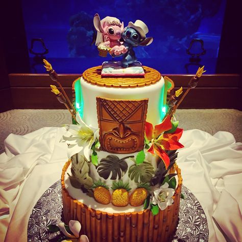 It's a Halloween wedding! Orlando DJ Chuck is celebrating a Tiki/Lilo and Stitch theme this afternoon  for Jamie and Bobby's reception. Congratulations!  #djsinorlando #orlandodjs #orlandodjservice #orlandodjchuck #djchuckjohnson Stitch And Angel Wedding Theme, Lilo And Stitch Themed Wedding, Lilo And Stitch Wedding Ideas, Stitch Wedding Theme, Lilo And Stitch Wedding Theme, Stitch Wedding Ideas, Stitch Wedding Cake, Lilo And Stitch Wedding, Lilo And Stitch Theme