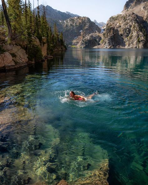 Let’s run away to the mountains. Dreaming of swimming in alpine lakes and camping in the forest. This was my favorite day last summer! We woke up at 4am to start hiking and watched sunrise on the way up. Ate some snacks, took a dip, and soaked up the sun. 📍 Sawtooth Mountains Are you planning some fun hiking/camping trips this summer? #alpinebabes #sawtoothmountains #idaho #girlswhohike #alpinelake #mountaingirls #hikingadventures #coldplunge #bluewater #idahoexplored #idahodaily Mountain Hiking Aesthetic, Sawtooth Mountains, Day At The Lake, Mountain Running, Mountain Vacation, Hiking Mountains, Hiking Aesthetic, Us Road Trip, Alpine Lake