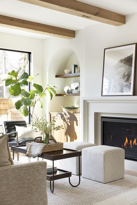 Favorite Fireplace Surrounds Just in Time for Cozy Season | Jkath Design Build Reinvent Jkath Design, Cast Stone Fireplace Surround, Cast Stone Fireplace, Stone Fireplace Surround, Natural Stone Fireplaces, Airy Room, Wood Mantels, Brick Fireplace, Living Room With Fireplace