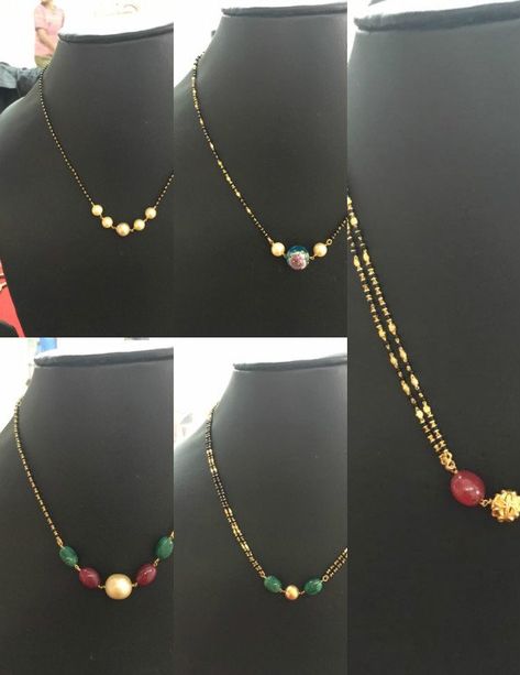 22 carat gold light weight short black beads mangalsutra chains adorned with ruby beads, emerald beads and south sea pearls. Coral Mangalsutra, Short Black Beads, Black Beads Chains, Mangalsutra Chain, Black Beads Mangalsutra, Black Beads Mangalsutra Design, Gold Mangalsutra Designs, Gold Chain Design, Long Pearl Necklaces