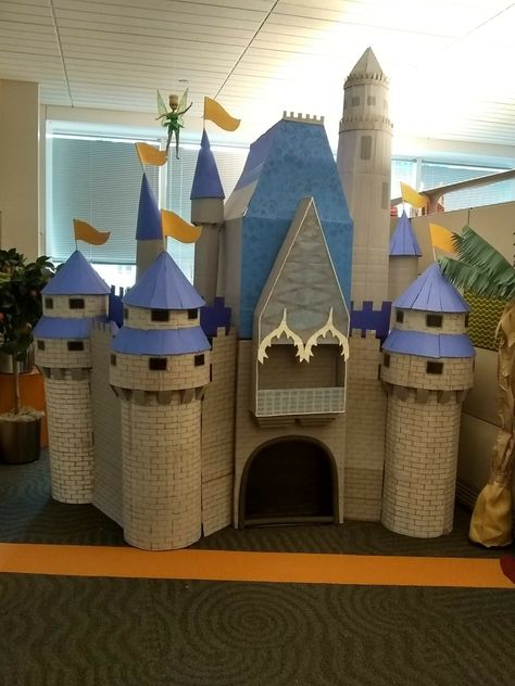 Cinderella's castle made all from cardboard. The base is my desk. Diy Cinderella Castle, Disney Castle Trunk Or Treat, Disneyland Castle Diy Cardboard, Cardboard Disney Castle Diy, Disney Castle Cardboard, Princess Castle Cardboard, Diy Cardboard Castle Playhouse, Disney Castle Cardboard Cutout, Cardboard Box Castle