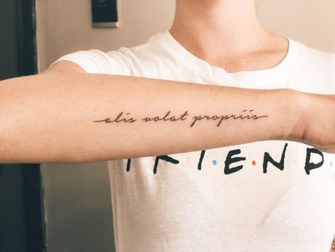 Alis Volat Propriis Tattoo, Forearm Script Tattoo, Wing Tattoo Arm, Wrist Tattoos Quotes, Latin Quote Tattoos, Arm Quote Tattoos, Latin Tattoo, Alis Volat Propriis, Wrist Tattoo Cover Up