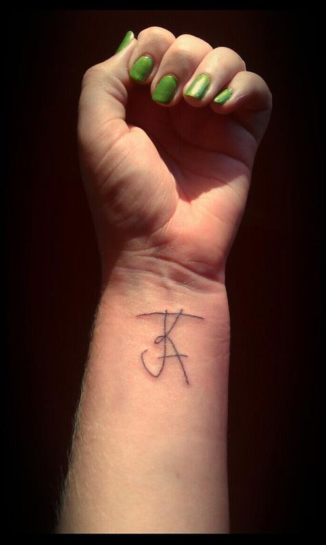 My second tattoo!!  It's a J, K, and A for John, Karen and Alex (My dad, mom and brother). K And J Tattoo, J And A Tattoo, J And K Tattoo, Second Tattoo, J Tattoo, K Tattoo, A J, My Dad, Jesus Fish Tattoo