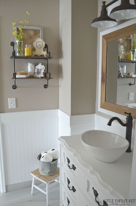 paint color, which is Smokestack by Behr. Farmhouse Master Bathroom Makeover Behr Smokestack, Contemporary Bathroom Faucets, Small Farmhouse Bathroom, Sofa Santai, Farmhouse Bathroom Design, Farmhouse Bathroom Remodel, Farmhouse Bathroom Vanity, Bathroom Paint, Bathroom Farmhouse Style