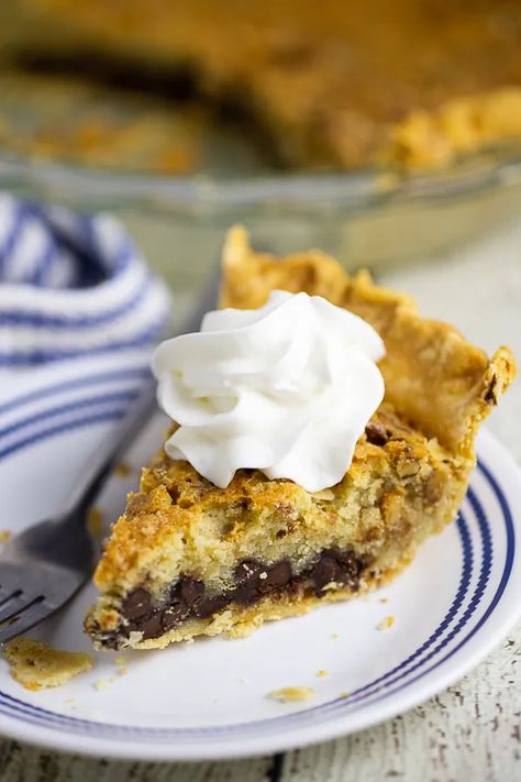 This take on Kentucky Derby pie is basically a warm gooey chocolate chip cookie with walnuts in a buttery flaky pie crust. Plus, it's super easy to whip up. How can you say no? Best Chocolate Pie Recipe, Derby Pie Recipe, Buttery Flaky Pie Crust, Kentucky Derby Pie, Derby Pie, Gooey Chocolate Chip Cookies, Buttermilk Pie, Chocolate Pie Recipes, Chocolate Pecan Pie