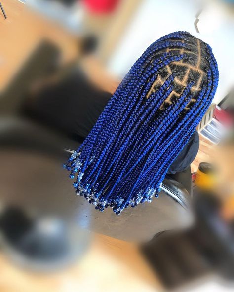 Explore 15 hottest knotless braids with beads hairstyles! From elegant updos to boho-chic looks, discover trending styles for a stunning, bead-adorned hair transformation. Click the article link for more photos and inspiration like this // #bohemianbraids #boxbraids #fauxlocs #goddessbraids #knotlessbraids #knotlessbraidswithbeads #locs #longknotlessbraids Blue Knotless Braids With Beads, Blue Braids With Beads, Trending Knotless Braids, Dark Blue Braids, Knotless Braids With Beads Hairstyles, Blue Knotless Braids, Blue Knotless, Braids With Beads Hairstyles, Knotless Braids With Beads