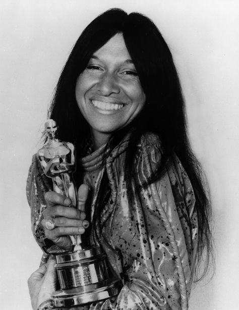 Buffy Sainte-Marie won an Academy Award Oscar in 1983 for Best Original Song, 'Up Where We Belong', from the 1982 film An Officer and a Gentleman. She wrote the music with Jack Nitzsche. The lyrics were written by Will Jennings. Buffy Sainte Marie, An Officer And A Gentleman, Songs Written, Robbie Robertson, Inuit People, Academy Museum, Cripple Creek, Country Song, Famous Movie Quotes