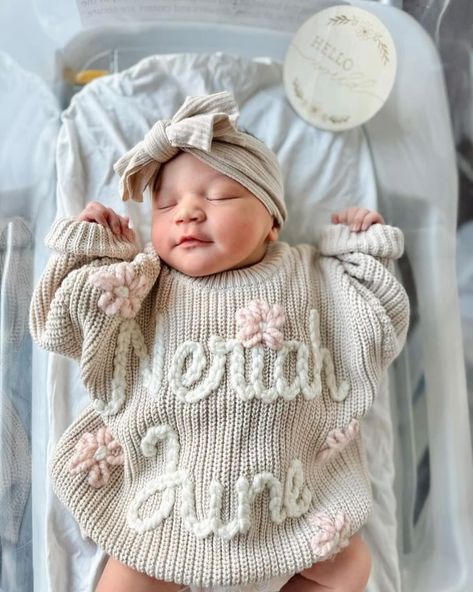 Little Miss 🤍🤍Neriah June🤍🤍 is completely PRECIOUS all snuggled in her custom sweater!! Such a perfect blessing with the most beautiful face. Welcome to the world, sweet angel!!! #themodmango #themodmangobabyco #babysweater #babynameannouncement #newborngift #newborngiftideas #babygirlsweater #newbornsweater #milestonesweater #handembroidery #handembroidered #custombabyboutique Newborn Going Home Outfit Girl, Baby Sweater With Name, Embroidered Baby Sweater, Newborn Hospital Outfit, Sweater With Name, Personalized Newborn Outfit, Baby Hospital Pictures, Newborn Hospital Outfits, Embroidery Yarn