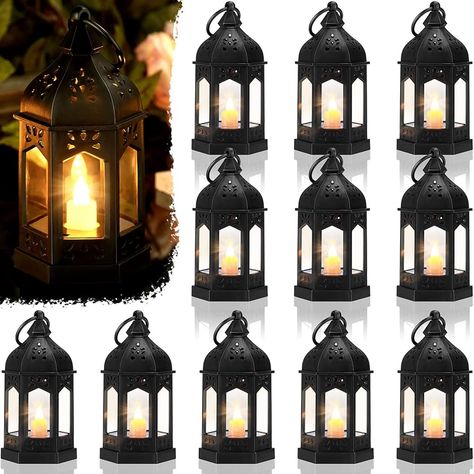 Amazon.com: 12 Pieces Mini Lanterns with Flickering Led Candle, Batteries Included, Decorative Hanging Candle Lantern for Indoor Use, Wedding, Party, Table Centerpiece (Black) : Home & Kitchen Dark Romantic Wedding, Lanterns Hanging, Hanging Candle Lanterns, Dark Wedding Theme, Lantern Wedding, Taylor Wedding, Lantern Centerpiece Wedding, Halloween Themed Wedding, Mini Lanterns