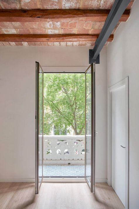 75 square meters, the center of the Eixample district in Barcelona, first floor with an elevator. The property that was intended for sale was presented to the studio half-naked with exposed concrete walls, just the place to start imagining. A very typical division for local construction, kitchen in a closed room, one bathroom, a space that wants to be a bedroom and small room without a window. #architecture #architect #amazingarchitecture #design #interiordesign #interiordesigner #homedecor Apartment Barcelona, Window Architecture, Barcelona Apartment, Concrete Walls, Exposed Concrete, Concrete Wall, Residential Building, Residential Architecture, Barcelona Spain