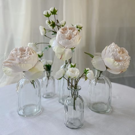 I loved this idea for our centre pieces at the wedding, I recently bought similar vases to use in our home. This is an affiliate link. Small Vase Centerpiece Round Table, Behind Top Table Decor Wedding, Bottle Vases Wedding, Highley Manor, Glass Wedding Centerpieces, Timeless Wedding Decor, Bud Vases Arrangements, Wildflower Centerpieces, Glass Bottle Vase