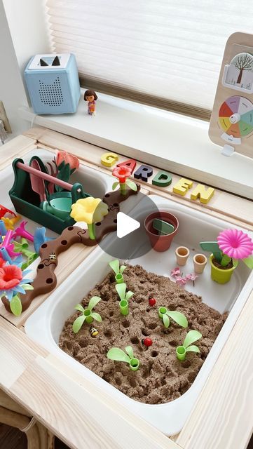 Kayleen on Instagram: "Target has the cutest little gardening set in their $5 section right now! It inspired me to create this fun little toddler gardening sensory setup.   Supplies:  Gardening set Flower pots  Kinetic sand  Flowers   Super simple and fun toddler activity. Have them plant the flowers and dig up the dirt. Can’t wait until the weather lets us go in a real garden :)   Sensory activity, toddler activity, gardening, flisat table, screen free morning, kinetic sand  #sensoryactivity #toddleractivitiesathome #flisattableplay #preschoolactivities #kineticsand #toddleractivities" Kinetic Sand Ideas, Sand Activities For Toddlers, Planting Sensory Bin, Kinetic Sand Sensory Bin, Kinetic Sand Activities, Toddler Gardening, Reggio Activities, Cousins Christmas, Garden Sensory