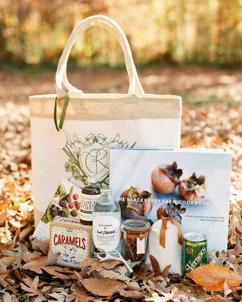 An Elegant, Autumnal Wedding in Tennessee | Martha Stewart Weddings - Welcome bags with the couple's crest were curated by A Signature Welcome, and held a Blackberry Farm cookbook, a schedule of events, and goodies from the area as well as the bride's and groom's home states. A handwritten note from the couple was tucked in for each recipient. Fall Wedding Welcome Bags, Blackberry Farm, Welcome Baskets, Wedding Welcome Gifts, Blackberry Farms, Welcome Bag, Curated Wedding, Wedding Bags, November Wedding