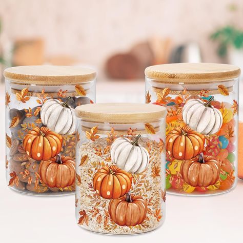 PRICES MAY VARY. PACKAGE INCLUDES: The package includes 3pcs fall glass storage jars, all have corresponding bamboo lids, allowing you for enough storage space. Sufficient for your daily use and replacement needs. CHIC STYLE: Our glass storage jars featuring the pumpkins and autumn leaves, adopt the warm orange tone, classic and delicate, full of festive autumn atmosphere, which can elevate your aesthetic taste for the kitchen decor. GOOD QUALITY: The glass jar is made of quality borosilicate gl Fall Gifts For Coworkers, Canister Crafts, Pumpkin Kitchen, Kitchen Countertop Decor, Countertop Decor, Orange Tone, Glass Storage Jars, Tidy Kitchen, Storage Canisters