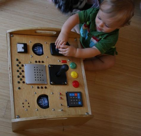 Kids tactile play box / control panel. Pretty neat!  Harrison plays with his box Mission Control Panel, Space Control Panel, Rocket Control Panel, Retro Control Panel, Space Station Control Panel, Sensory Wall, Mission Control, Baby Life Hacks, Busy Board