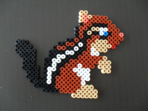 Squirrel perler beads by Veronique Celis Perler Bead Mario, Melty Bead Patterns, Pearl Beads Pattern, Fusion Beads, Hama Beads Design, 8bit Art, Diy Perler Bead Crafts, Hama Bead, Beads Craft