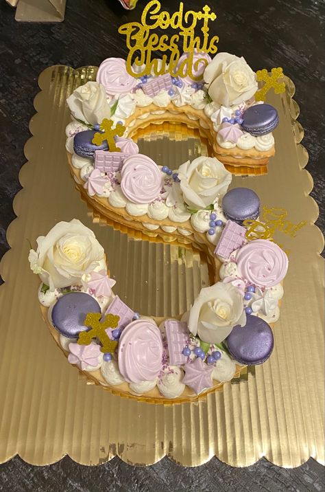 White roses, First Communion toppers, purple meringues, purple sanding sugar sprinkles, purple edible pearls, purple French macaroons and mini purple chocolate bars. Letter Cakes, Cake Lettering, Letter Cake, Purple Cakes, S Letter, Letter S, First Communion, Pre Wedding, Diaper Cake