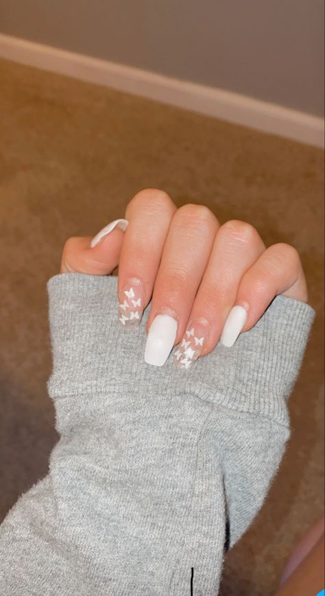 Nails White With Butterfly, Butterfly White Nails, White Nails And Butterflies, Cute Short Acrylic Nails White With Butterflies, Grey Butterfly Nails, White And Silver Butterfly Nails, White Butterfly Nails Almond, White Glitter Nails With Butterflies, Clear Nail Designs