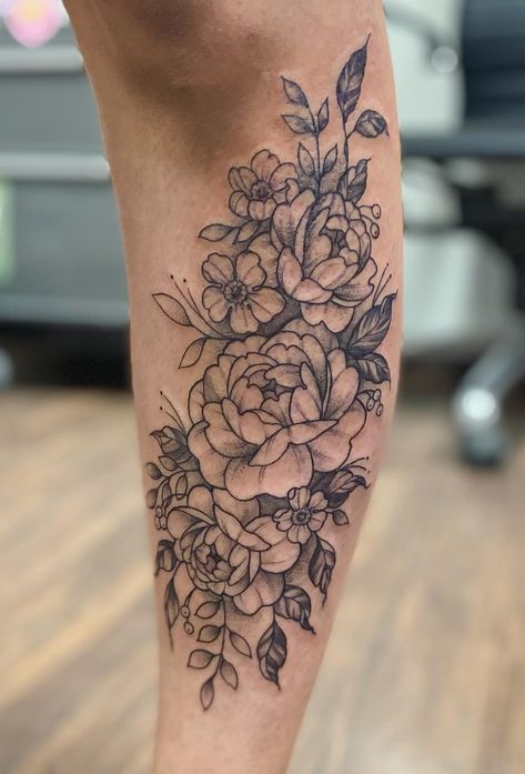 Fine line floral piece on the shin, done by @sydneyctattoo. We love the placement and design, with it beginning to wrap around the leg. Very light shading within this piece, though obvious darks and lights to separate the flowers and vines. Fine Line Floral, Wrap Around Tattoo, Shin Tattoo, Mama Tried, Floral Tattoos, Floral Sleeve, Floral Wraps, Best Tattoo, Line Tattoos