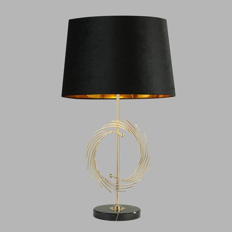 This Amanda 56cm Table Lamp offers a great modern touch for a living room or bedroom. The design features a round marble base, gold stem, as well as a tapered black shade and golden interior. The sleek design is great for a contemporary setting.Features:Type: StandardBase Colour: GoldBase Material: MetalBase Material Details: SteelWood Type: Number of Lights: 1Dimmable: YesIntegrated LED: NoIntegrated LED Wattage: Integrated LED Brightness (Lumens): Integrated LED Colour Temperature: Integrated Table Lamps Uk, Golden Interior, Fixture Table, Contemporary Table Lamps, Contemporary Table, Table Lamp Sets, Black Shade, Lamp Sets, Lamp Shades