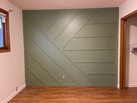 Sage Green accent wall made with pack of 10 base boards Olive Shiplap Wall, Soft Green Accent Wall, Laurel Tree Behr Paint, Boy Nursery Accent Wall Ideas, Sage Shiplap, Board And Batten Wall Green, Behr Laurel Tree, Light Green Accent Wall, Olive Green Accent Wall